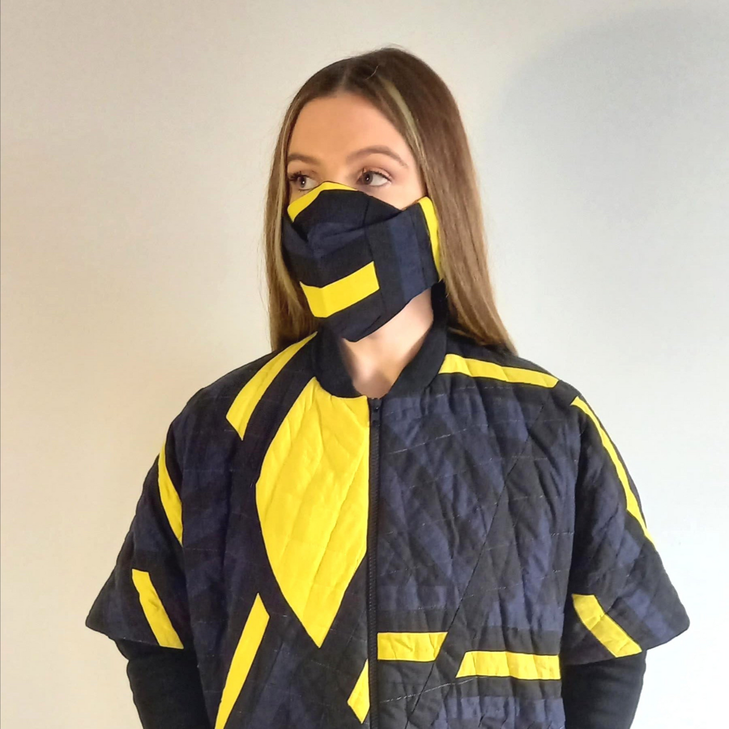 Woman wearing The Costume Room Irish Linen Patchwork Origami Face Covering-mask-accessories