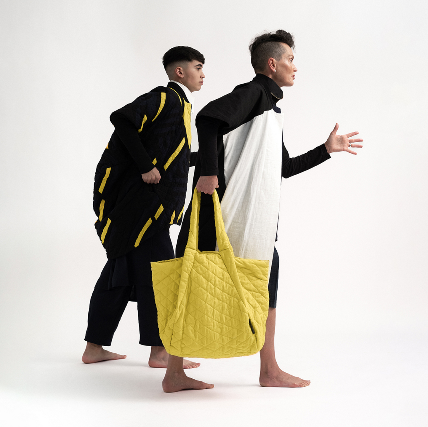 Man and woman wearing The Costume Room gender neutral sustainable clothes and accessories