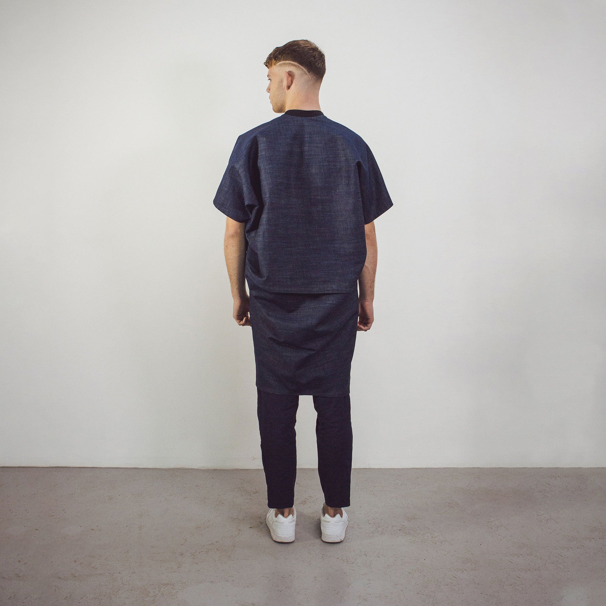 Man wearing The Costume Room Raw Organic Denim Cocoon Long Jacket