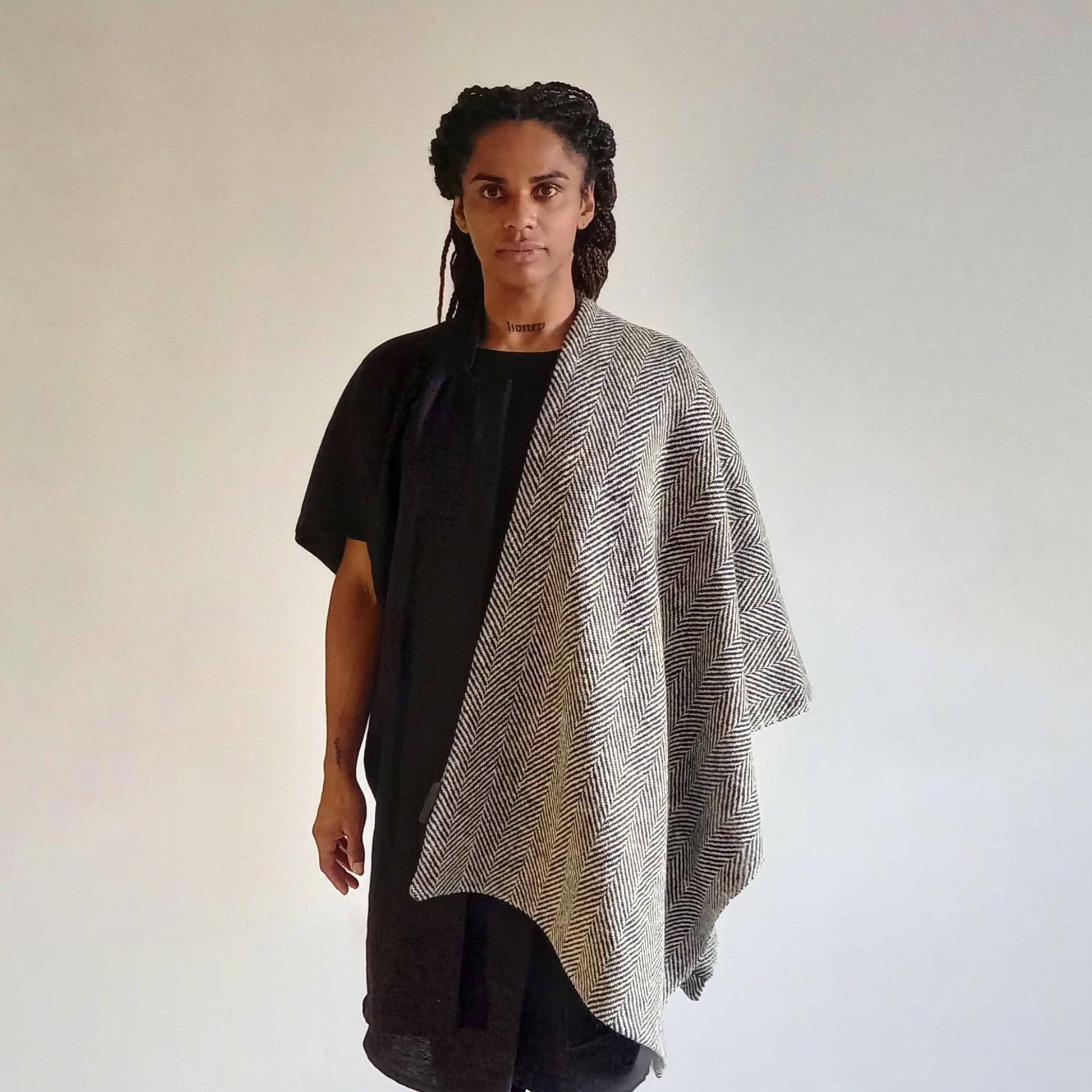 Handwoven Donegal Tweed Throw is the perfect sustainable Christmas gift. Handmade in Ireland can also be worn as a scarf.