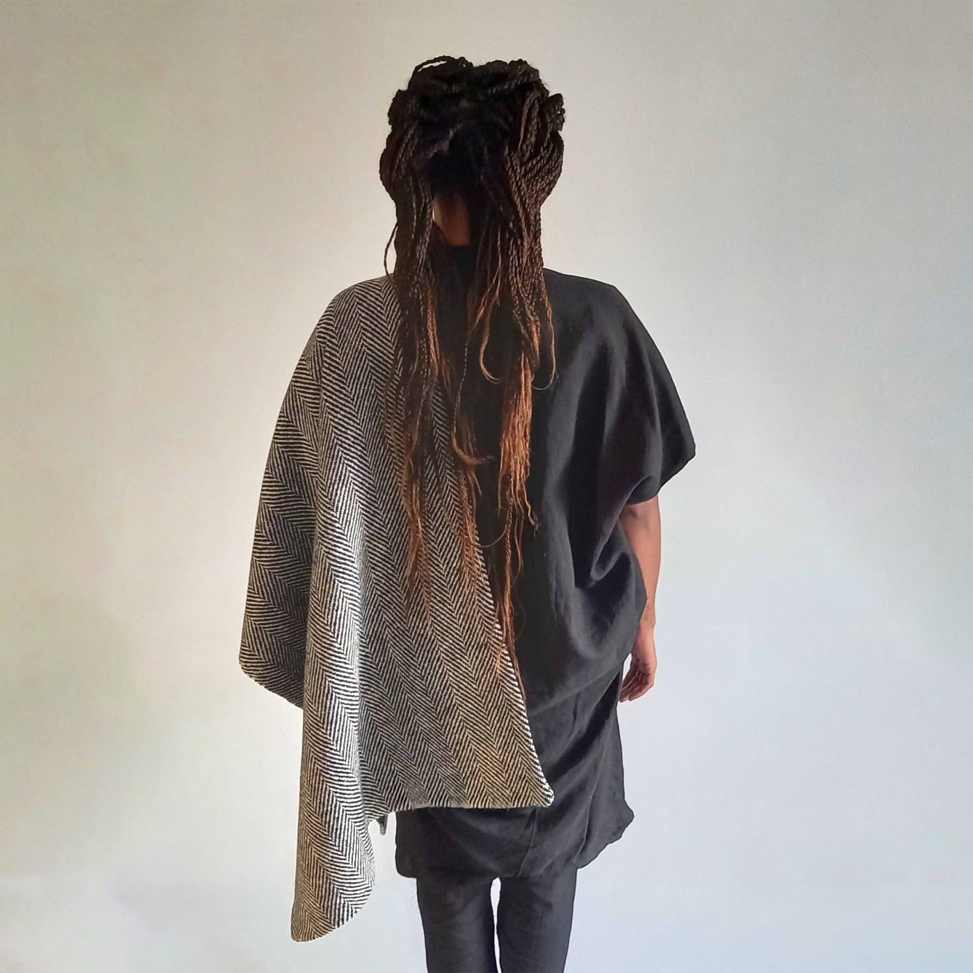 Handwoven Donegal Tweed Throw is the perfect sustainable Christmas gift. Handmade in Ireland can also be worn as a scarf.