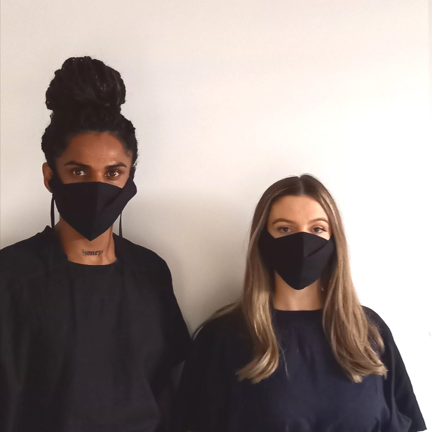 Man and woman wearing The Costume Room Black Linen Origami Face Coverings-masks-accessories