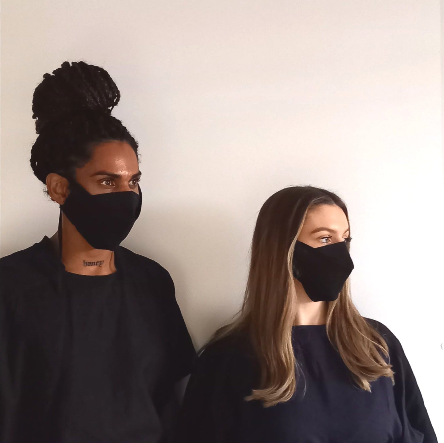 Man and woman wearing The Costume Room Black Linen Origami Face Coverings-masks-accessories