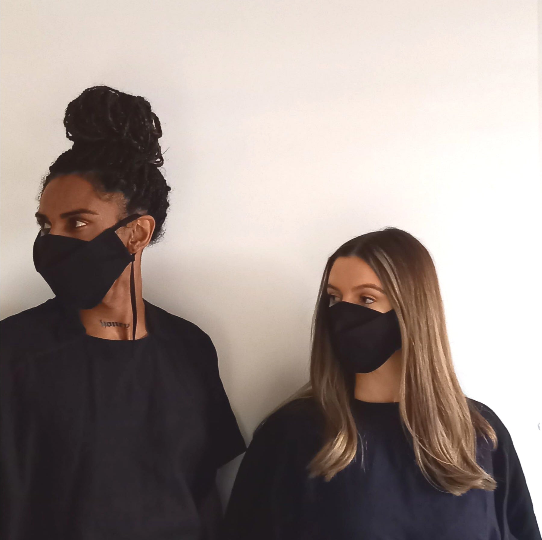 Man and woman wearing The Costume Room Black Linen Origami Face Coverings-masks-accessories