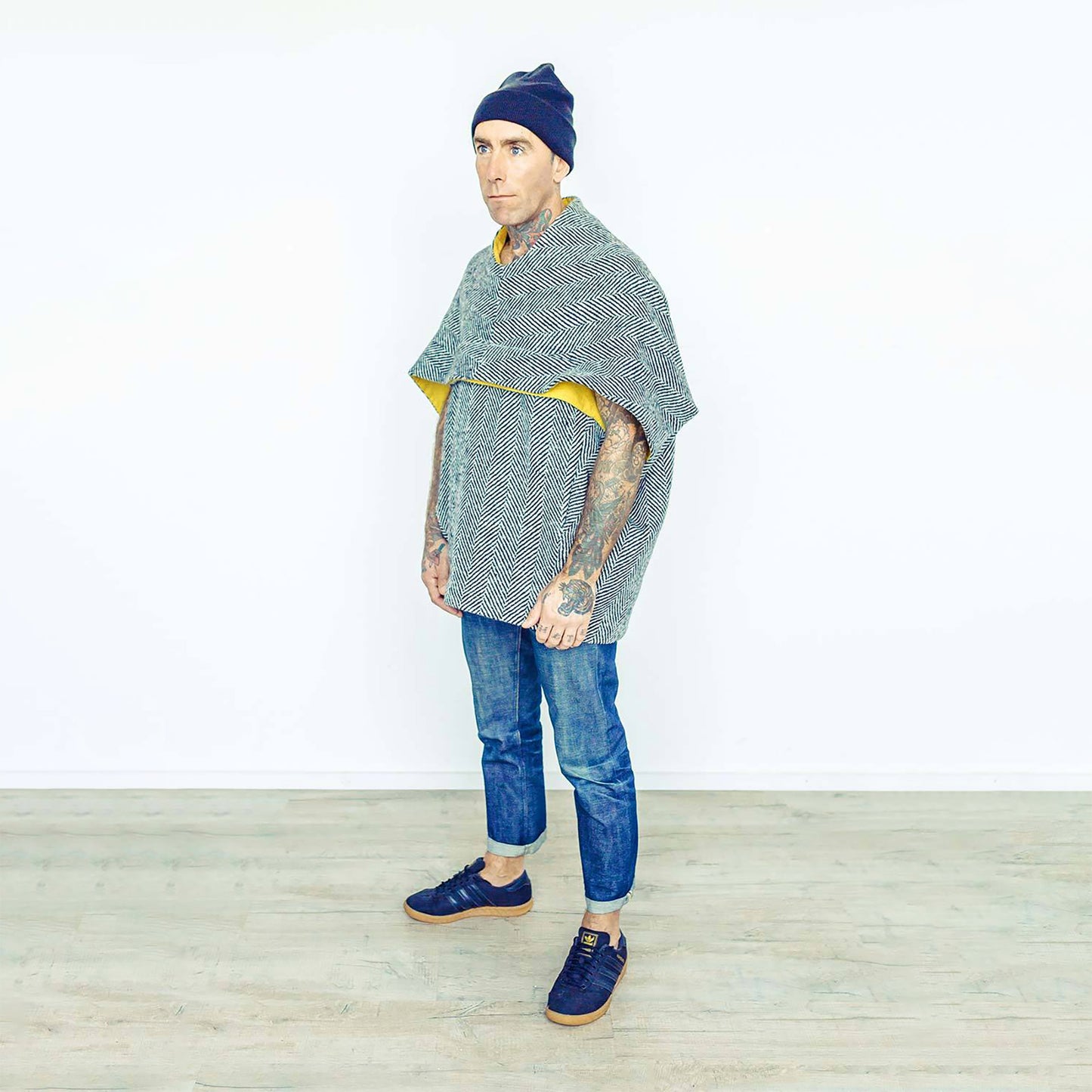 Man wearing The Costume Room monochrome herringbone Handwoven Donegal Tweed Cocoon Top