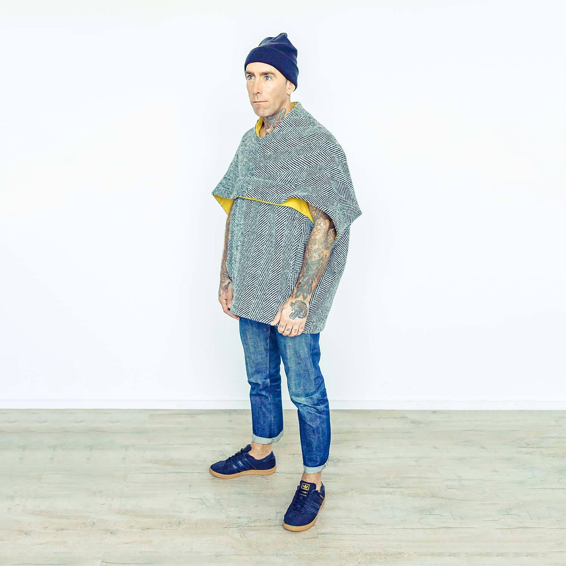 Man wearing The Costume Room monochrome herringbone Handwoven Donegal Tweed Cocoon Top