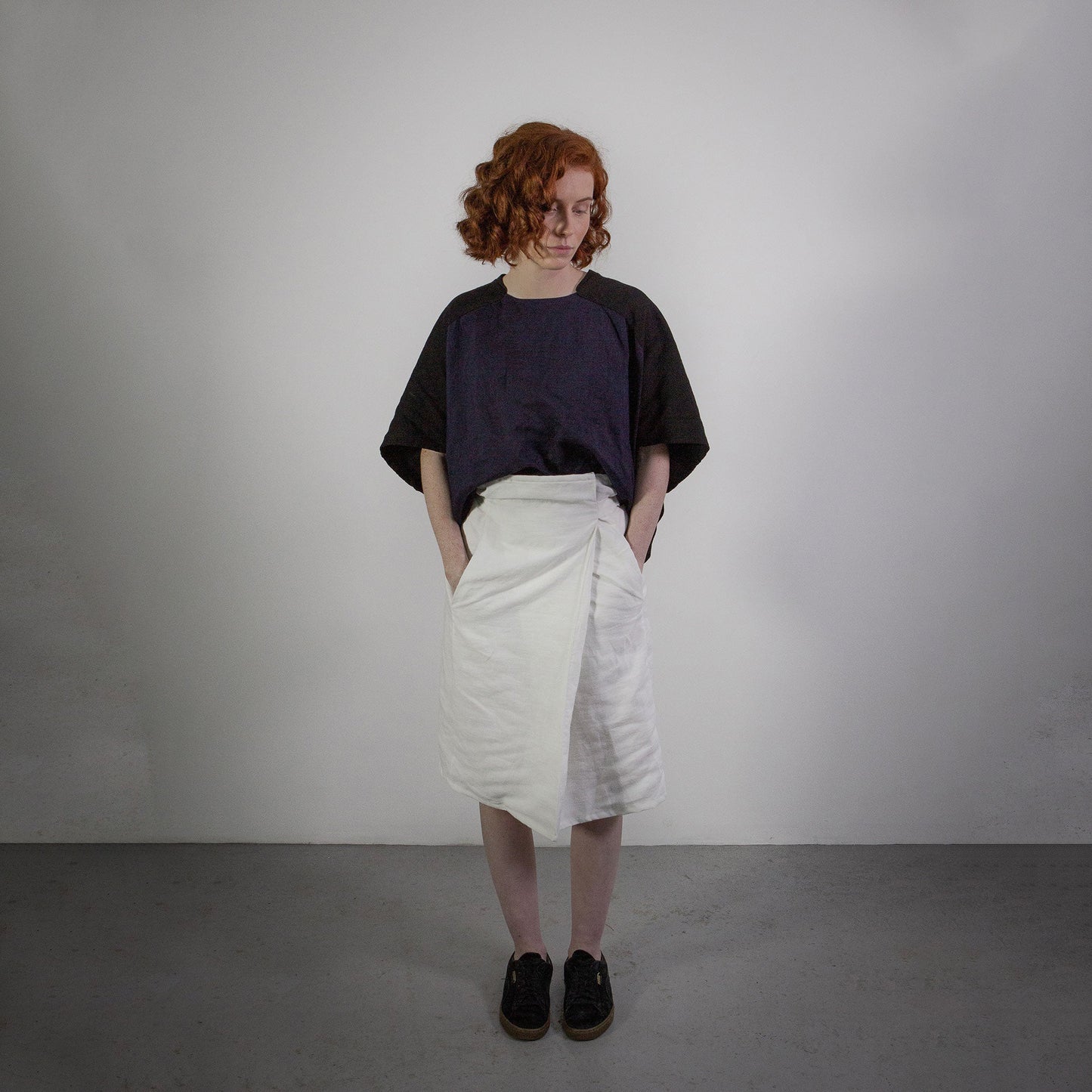 Woman wearing The Costume Room White 100% Pure Irish Linen Asymmetric Skirt
