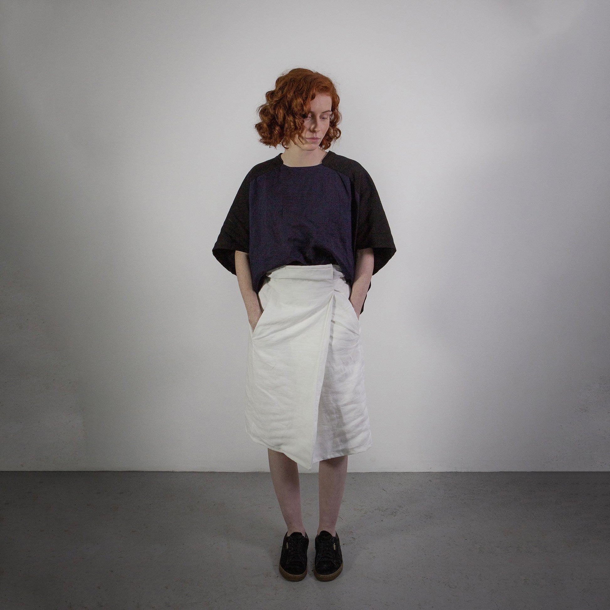 Woman wearing The Costume Room White 100% Pure Irish Linen Asymmetric Skirt