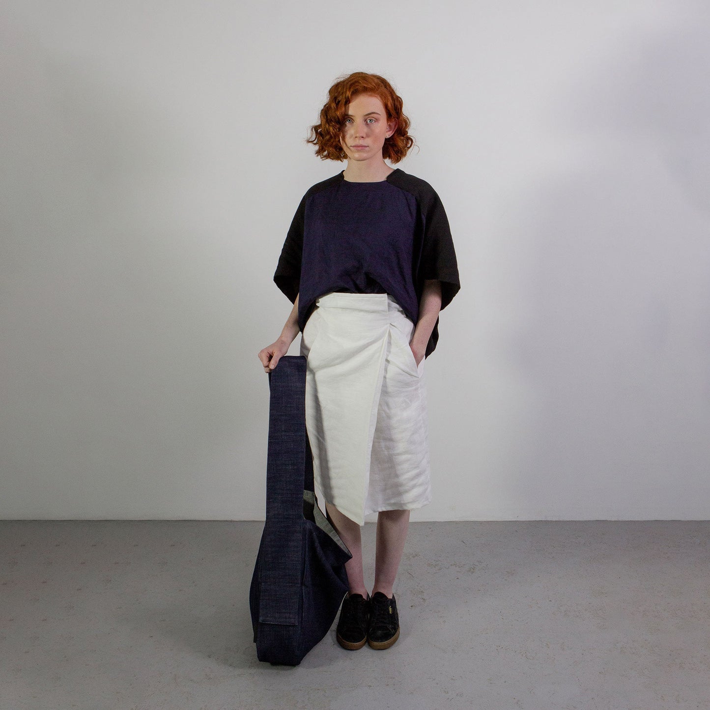 Woman wearing The Costume Room White 100% Pure Irish Linen Asymmetric Skirt