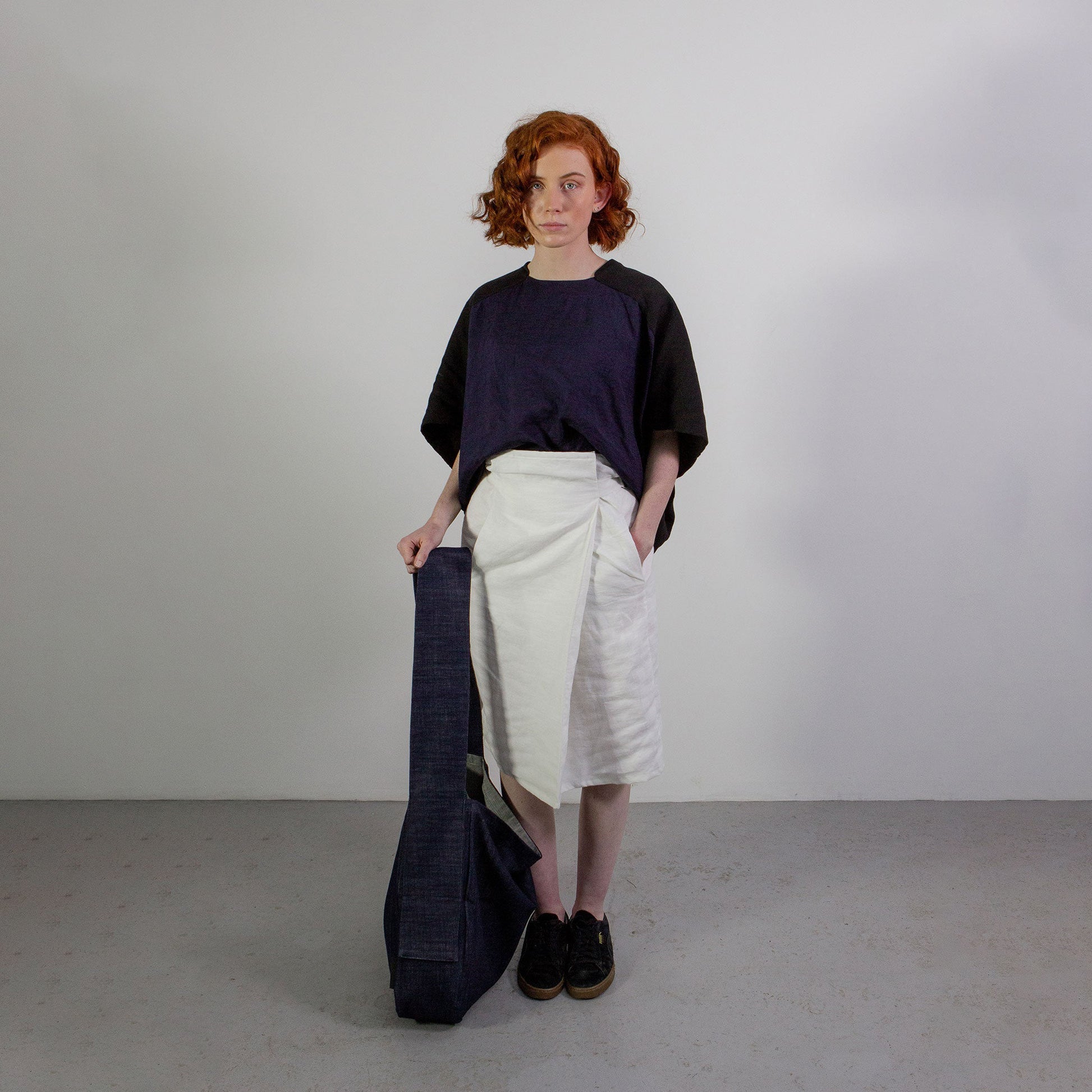 Woman wearing The Costume Room White 100% Pure Irish Linen Asymmetric Skirt