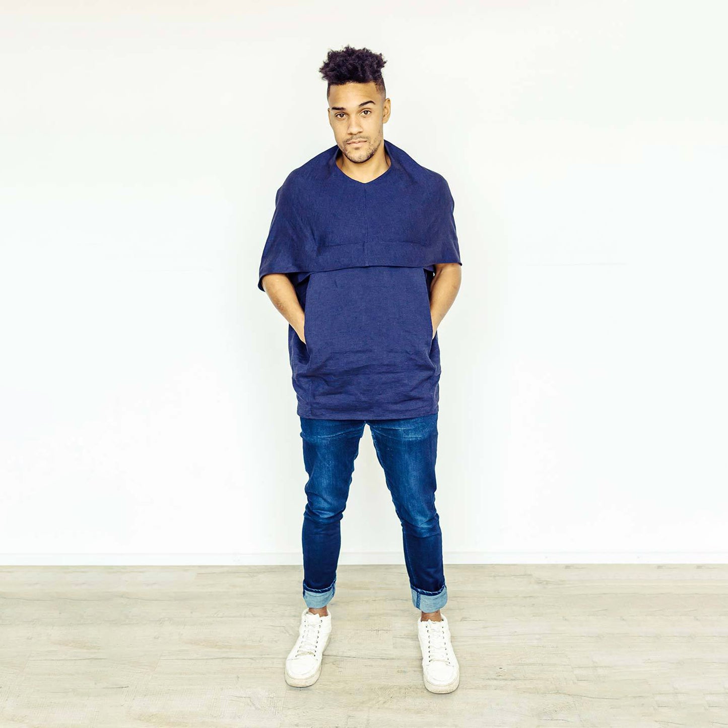 Man wearing The Costume Room navy blue 100% Pure Irish Linen Cocoon top with pockets