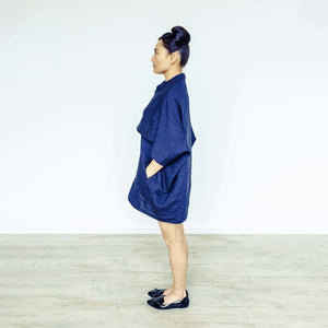 Woman wearing The Costume Room navy blue 100% Pure Irish Linen Cocoon dress with pockets