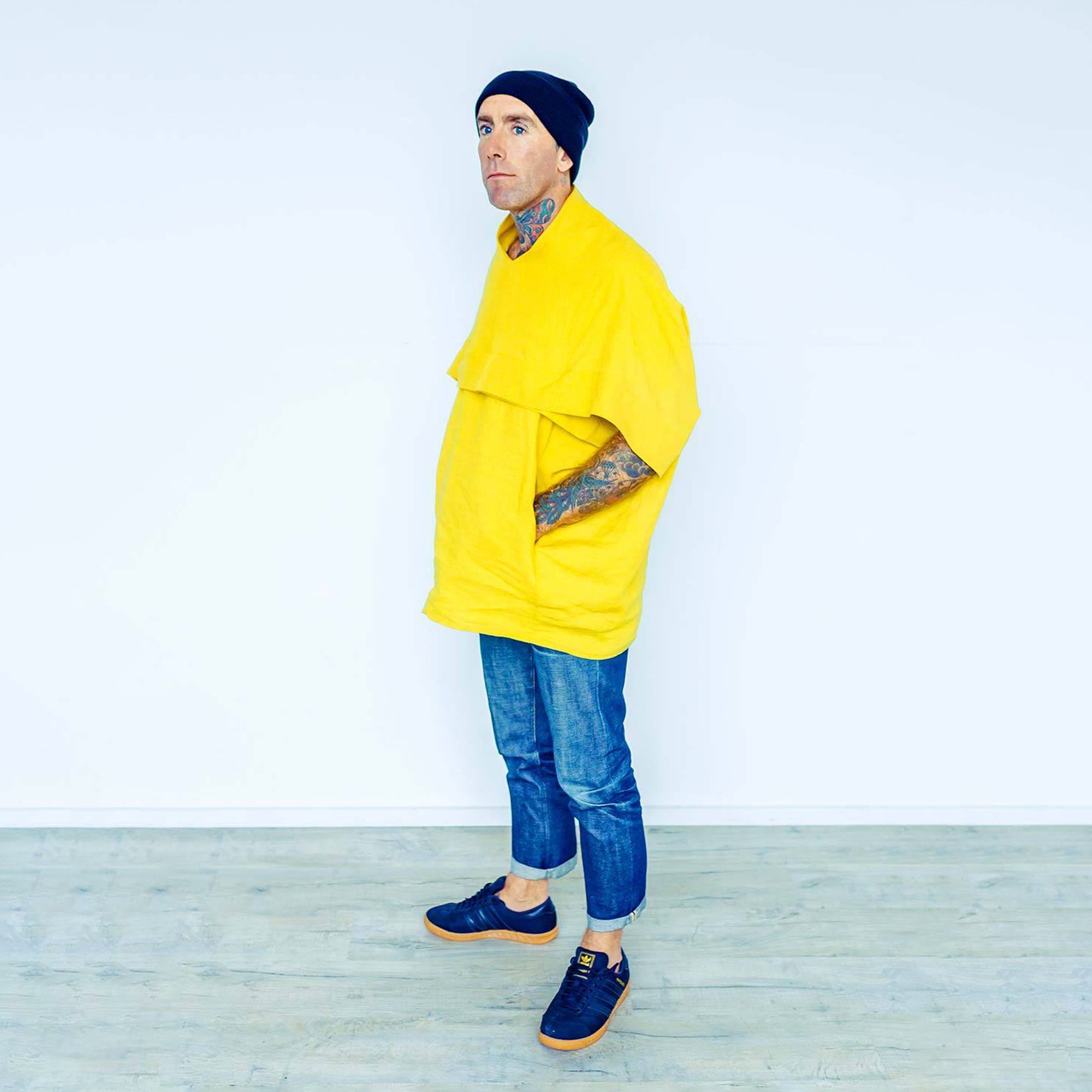 Man wearing The Costume Room sunshine yellow 100% Pure Irish Linen Cocoon top with pockets