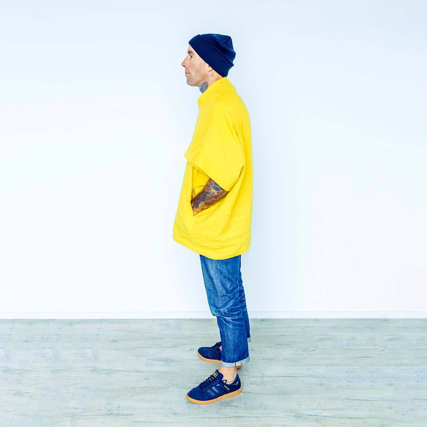 Man wearing The Costume Room sunshine yellow 100% Pure Irish Linen Cocoon top with pockets