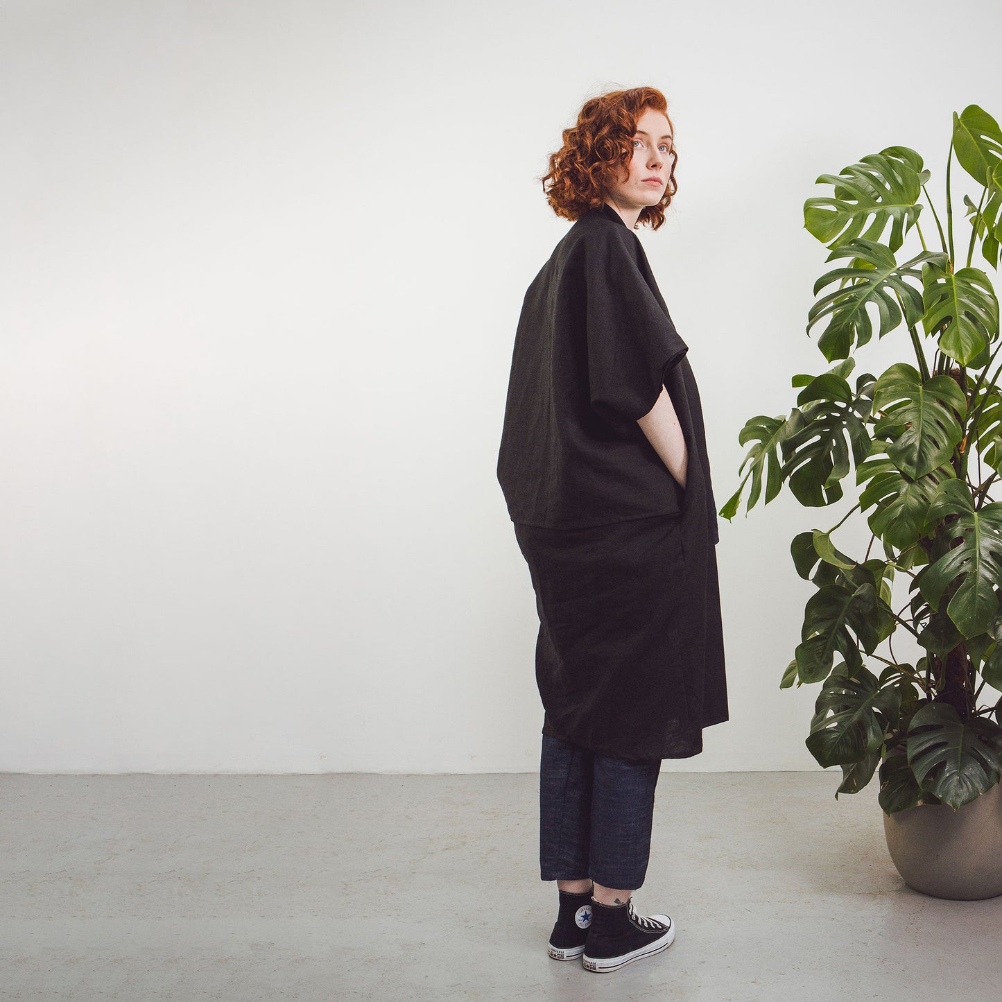 Woman with red hair wearing The Costume Room Black 100% Pure Irish Linen Cocoon Long Jacket