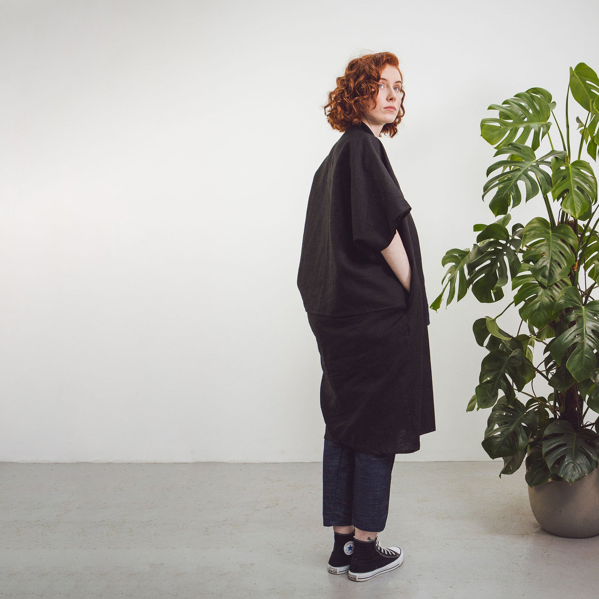Woman with red hair wearing The Costume Room Black 100% Pure Irish Linen Cocoon Long Jacket