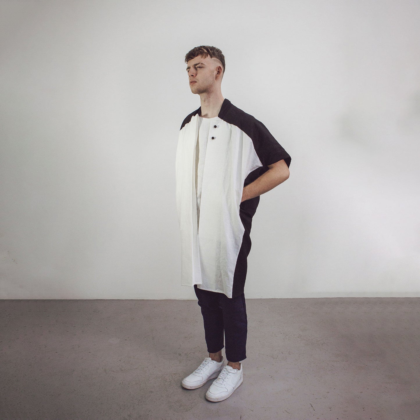 Man wearing The Costume Room black and white 100% Pure Irish Linen Cocoon Long Jacket