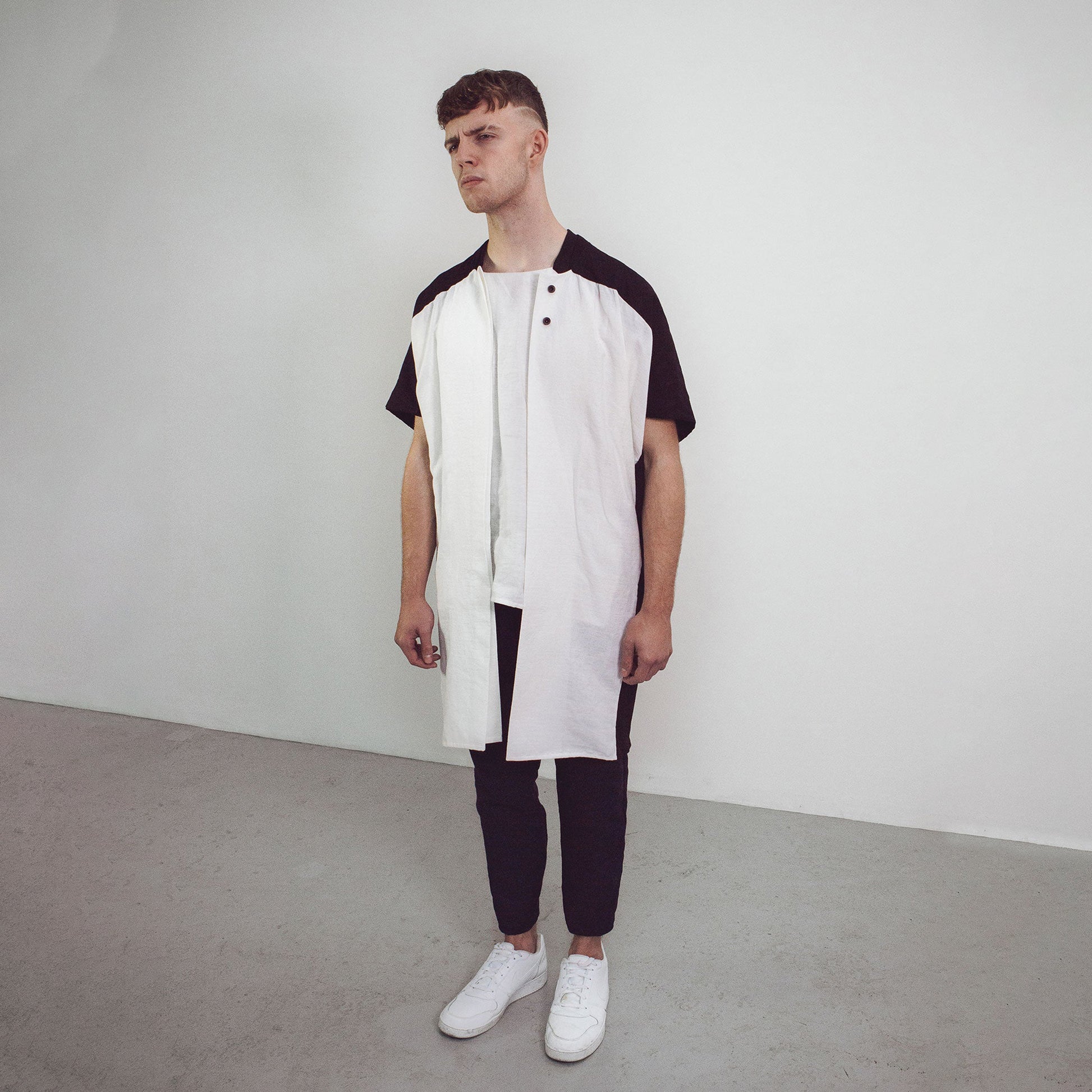 Man wearing The Costume Room black and white 100% Pure Irish Linen Cocoon Long Jacket