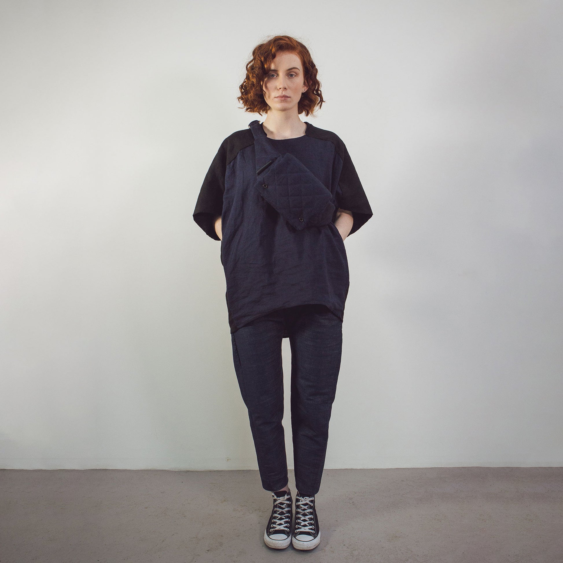 Woman wearing The Costume Room black and navy blue Linen Cocoon Top with pockets-gender-neutral