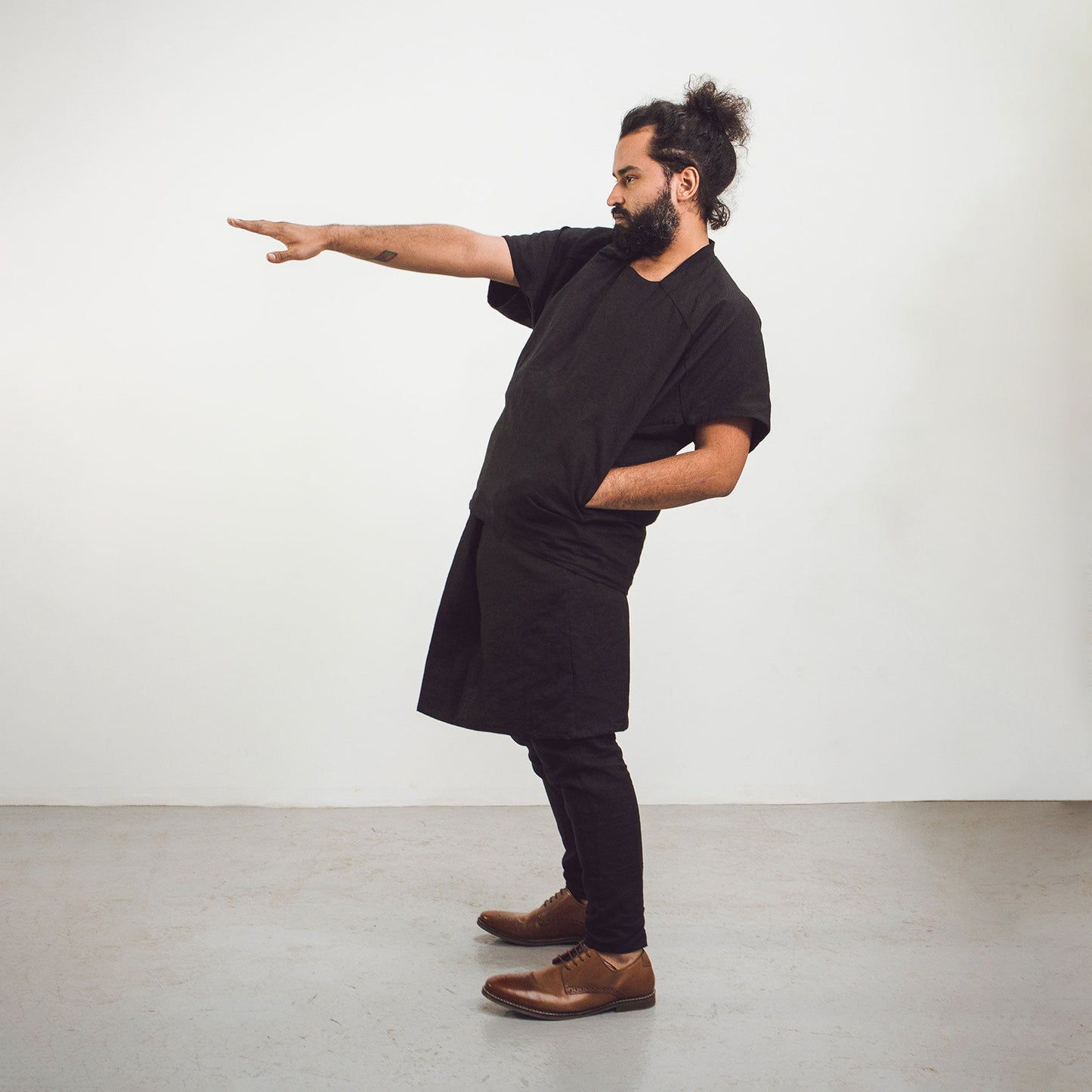 Man wearing The Costume Room black Linen Cocoon Top with pockets-gender-neutral