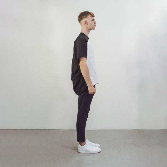 Man wearing The Costume Room black and white Linen Cocoon Top with pockets-monochrome-gender-neutral