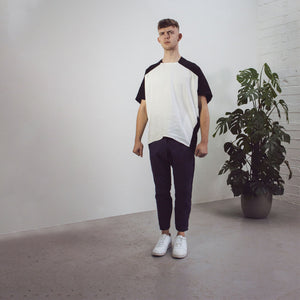Man wearing The Costume Room black and white Linen Cocoon Top with pockets-monochrome-gender-neutral
