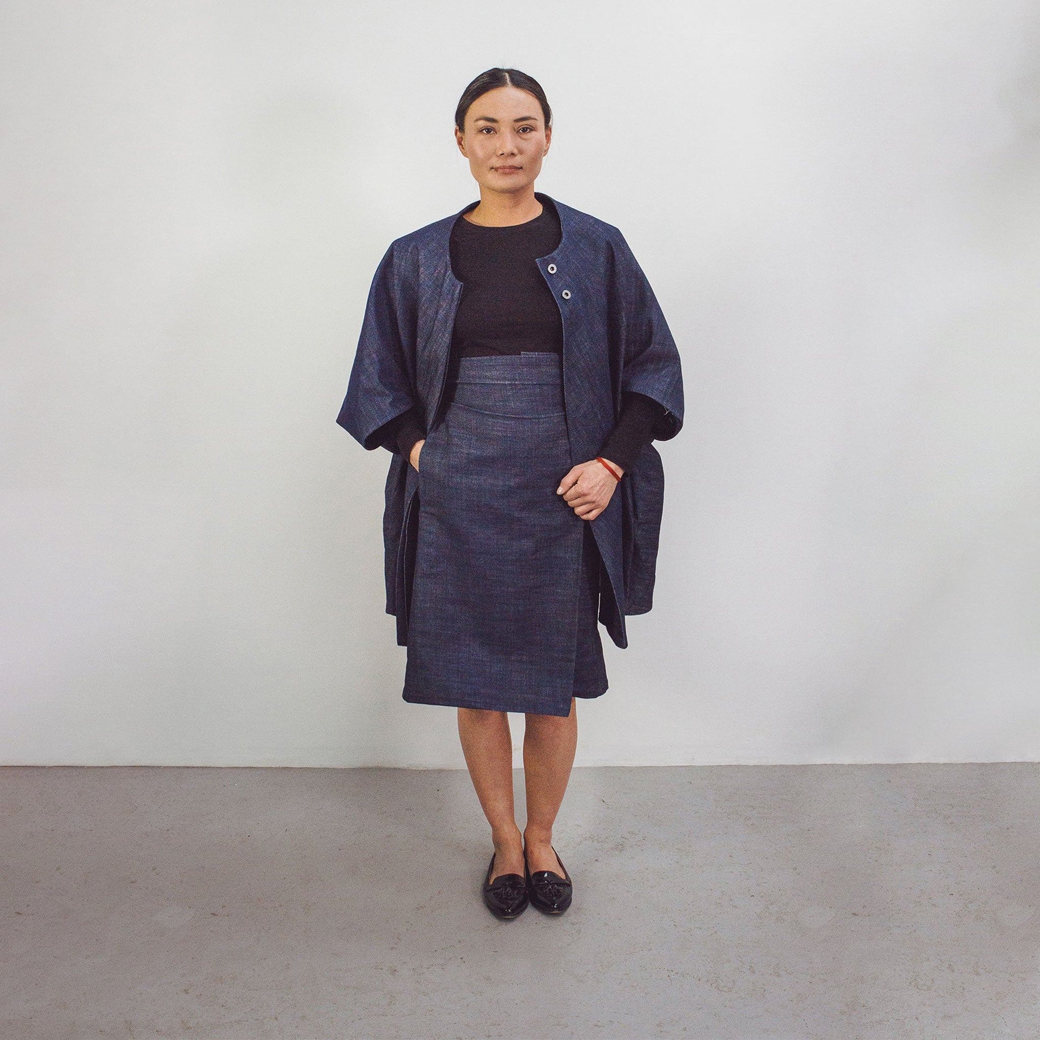 Woman wearing The Costume Room Raw Organic Denim Cocoon Coat