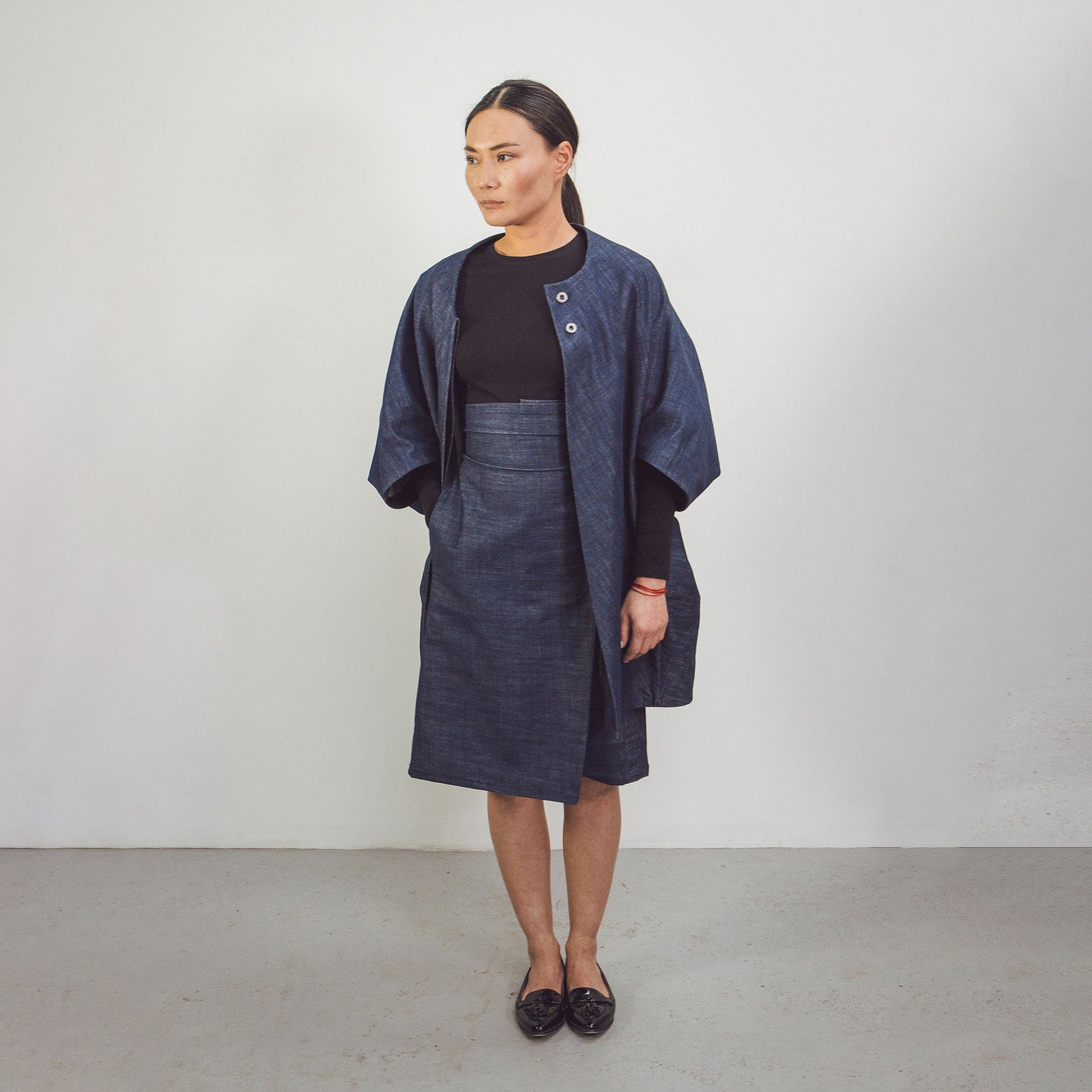 Woman wearing The Costume Room Raw Organic Denim Cocoon Coat