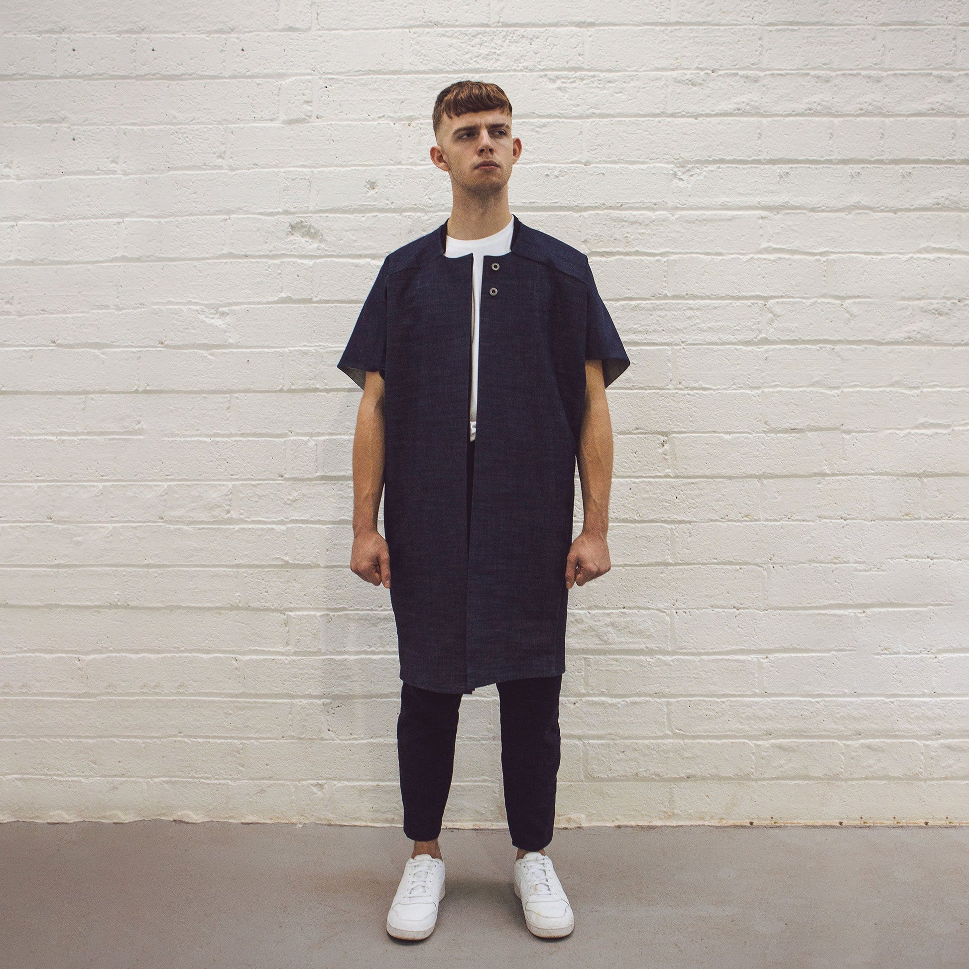 Man wearing The Costume Room Raw Organic Denim Cocoon Long Jacket