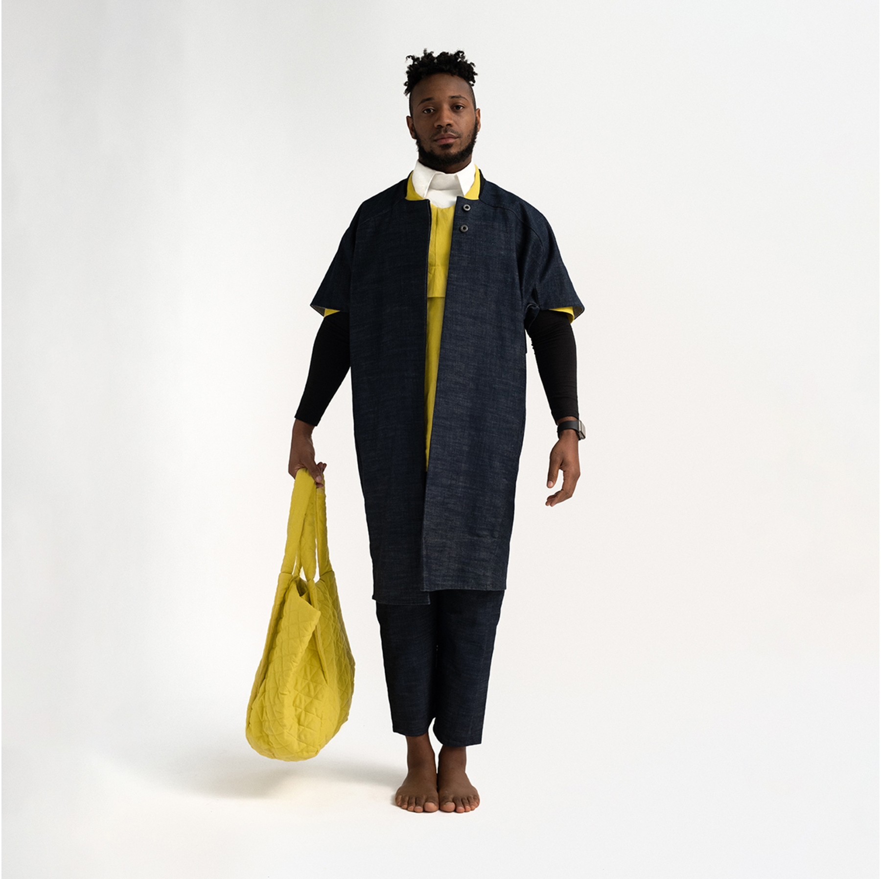 Man wearing The Costume Room Raw Organic Denim Cocoon Long Jacket