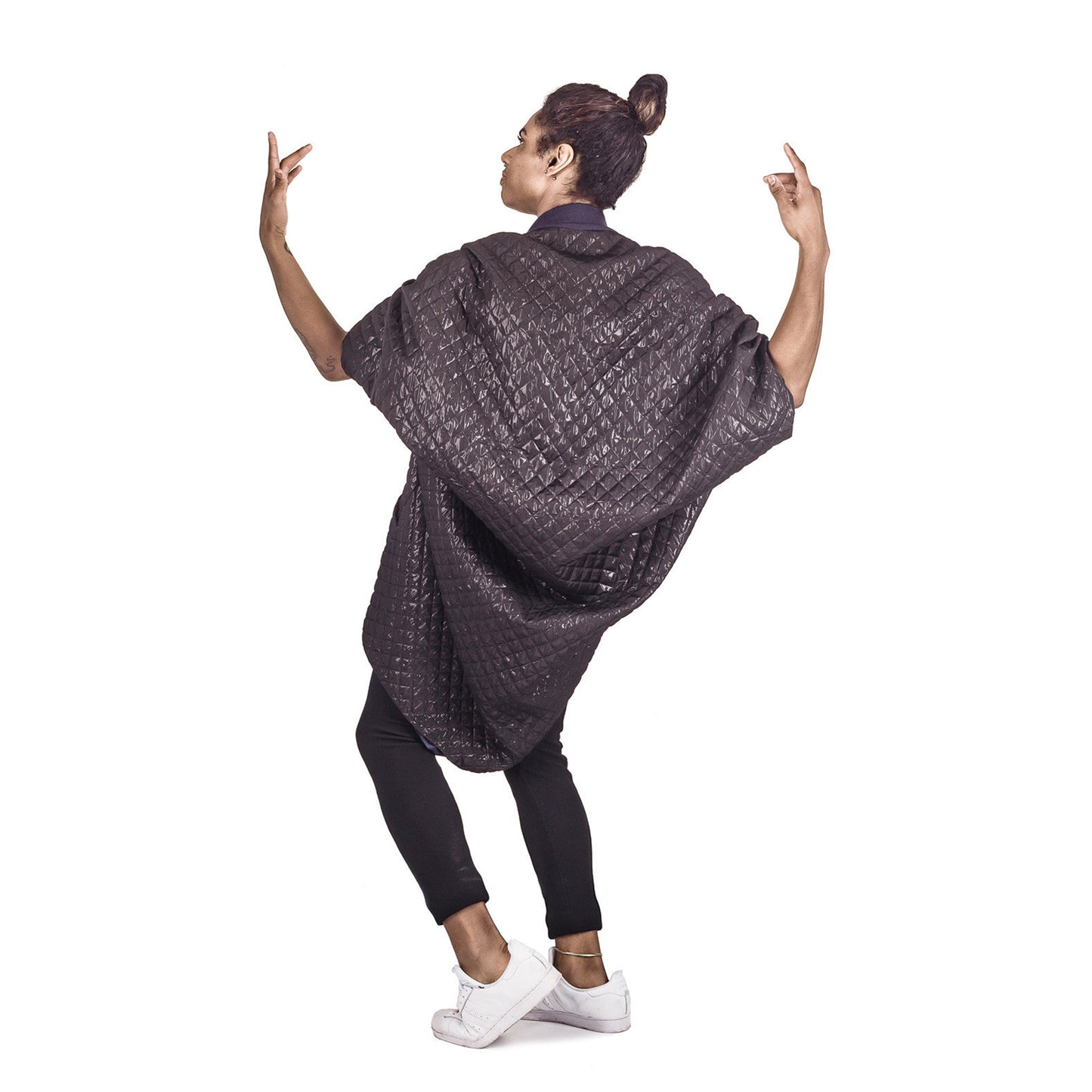 Man wearing The Costume Room The Shell kimono style black shiny coat with navy blue collar